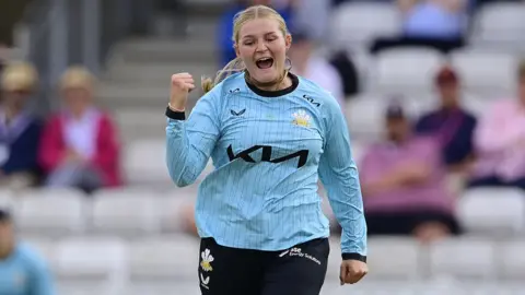 Ryana MacDonald-Gay celebrating taking a wicket for Surrey