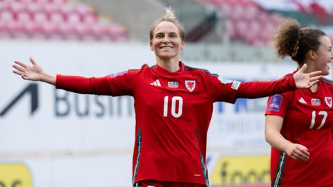 Jess Fishlock celebrates her goal against Kosovo