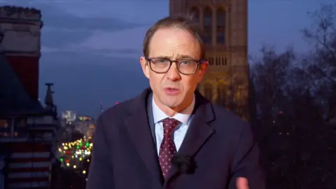 Chris Mason wearing a spotty tie outside Westminster