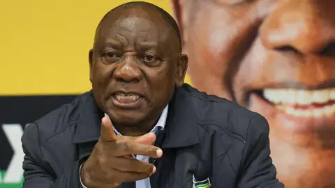 President of the African National Congress (ANC) and South African President Cyril Ramaphosa reacts during the party's National Executive Committee (NEC) meeting at Birchwood Hotel in Borksburg, east of Johannesburg on June 6, 2024. 