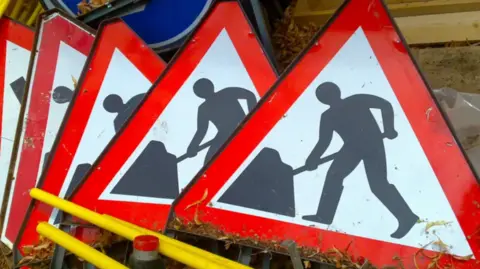 Getty Images A generic image of five triangular street closure signs.