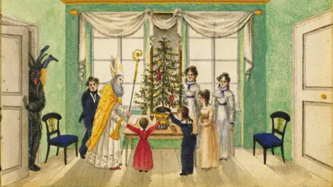 Getty Images A drawing from Austria showing a Christmas party in 1820, a family stand in a room with green walls and ornate curtains, around a Christmas tree. They meet St Nicholas and Krampus is standing at the door. 