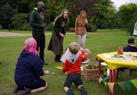 Yui Mok/PA Wire The princess and the US first lady joined 20 Squirrel Scouts taking part in nature activities on the Windsor Castle estate to earn their Go Wild badges