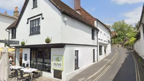 Google Maps Olivo restaurant, one of the buildings up for auction