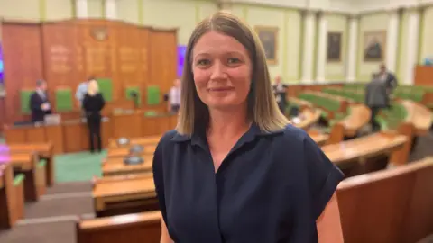 Dr Tracey Wond in the council chamber at Derbyshire County Council following the planning committee's decision to reject the application