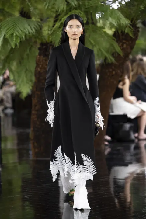 Victor VIRGILE/Gamma-Rapho via Getty Images A model walks the runway during the Christian Dior Haute Couture Fall/Winter 2026-2027 fashion show as part of Paris Fashion Week on July 06, 2025 in Paris, France. 