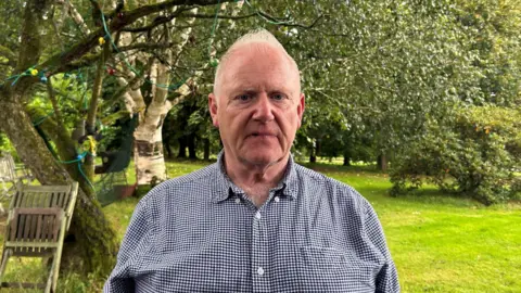 Burnt vehicles outside Lisnevenagh Road property