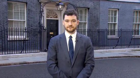 Henry Zeffman looks at the camera as he stands outside No 10