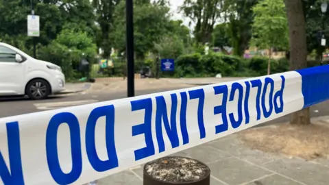 BBC Police cordon tape in west London