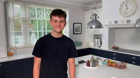 Max in his kitchen