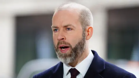 Business Secretary Jonathan Reynolds talking to the media outside BBC Broadcasting House in London, after appearing on the BBC One current affairs programme, Sunday with Laura Kuenssberg.