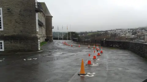 Carmarthenshire Council Carmarthen council carpark, cordoned off area with traffic cones, to allow scanning for bodies