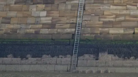 North Yorkshire Council A new steel ladder on a pier built of stone