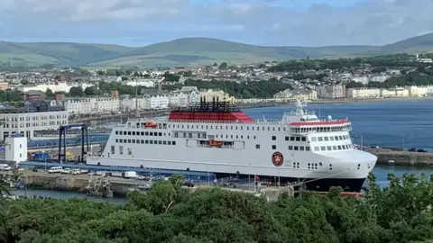 The Manxman moored in Douglas Harbour on a bright day.