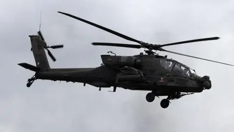 image of military helicopter flying