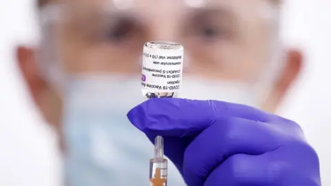 Danny Lawson/PA Wire Covid-19 vaccine