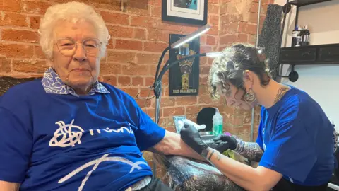 BBC Winifred Pinner getting a tattoo from Gemma