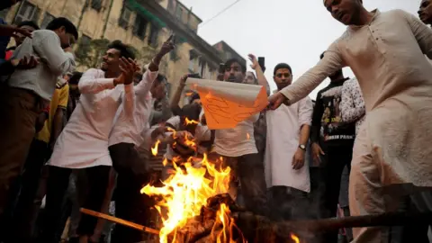 EPA Kolkata protesters burning an effigy of Prime Minister Narendra Modi