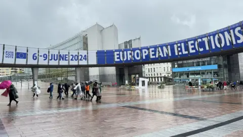 Dursun Aydemir/Anadolu A view of the giant banners announcing the elections at the entrance of the EP building as the countdown to the European Parliament (EP) parliamentary elections (6-9 June) begins in Brussels, Belgium on April 16, 2024