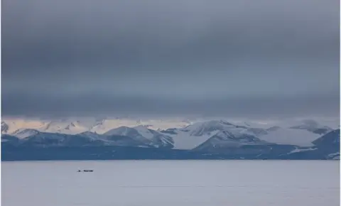 BBC Antarctic landscape with mountains and tents