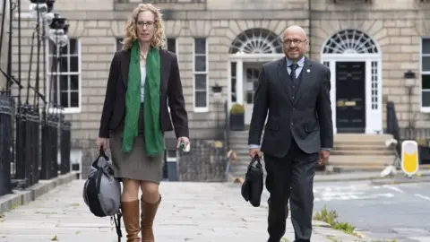 PA Media Lorna Slater and Patrick Harvie