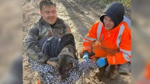 Dr Drainage Josh Longford and Brad Bottomley with Martha the dog