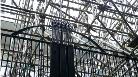 PA Media Part of the original metal railings at the front of the Glasgow School of Art's Mackintosh building