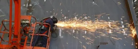 PA Welder working on new aircraft carrier