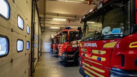 Humberside Fire And Rescue Service engines parked in one of the service's stations.