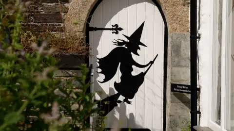 Witch on a door