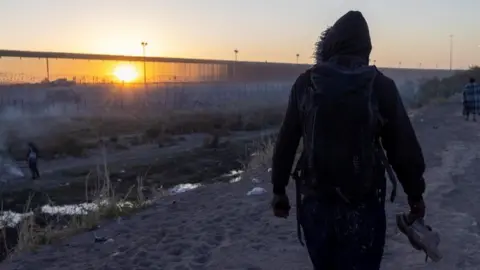 Migrant at the US-Mexico border