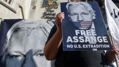 Getty Images Placards supporting Julian Assange outside courthouse