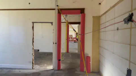 Renovation work happening in an empty building.
