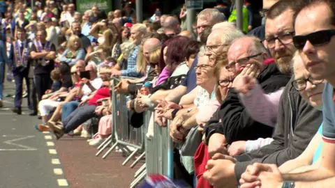 Spectators lined the streets of Belfast as the parade made its way along the route