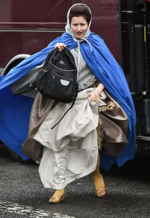 Getty Images Cast member in costume