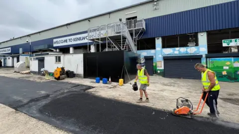 James Burridge/BBC Workers at Kenilworth Road in Luton