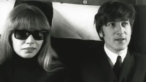 Getty Images Image shows Astrid Kirchherr and John Lennon in 1964