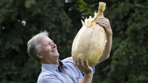 PA Media Gareth Griffin with his onion