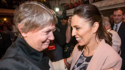 Getty Images Helen Clark and Jacinda Ardern embrace in 2017