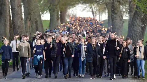 EPA Citizens of Stavtrup near Aarhus, Denmark, gather on April 25th 2019 for a commemoration