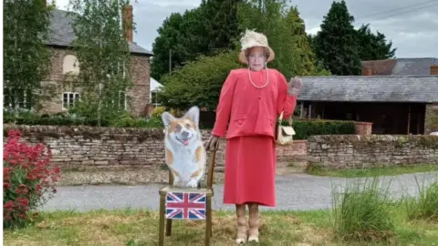 PA Media Queen and Corgi scarecrow