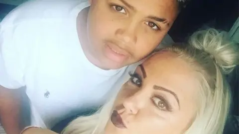 Family handout Keelan Wilson with his mother Kelly