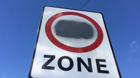 BBC Sprayed over sign