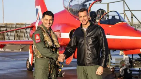 Ministry of Defence Wing Cdr David Montenegro, left, with Wing Cdr Adam Collins