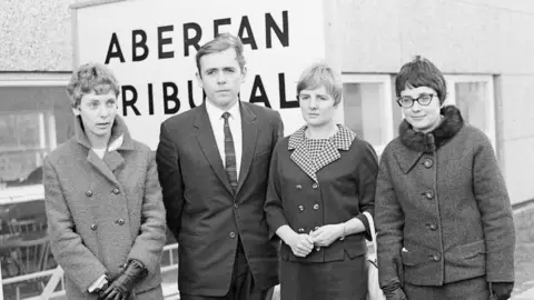 Getty Images Aberfan Disaster Tribunal, Merthyr Tydfil College of Further Education, Wales, 30th November 1966, picture shows surviving schoolteachers from Pantglas Junior School (from left to right) Hettie Taylor aka Hettie Williams, Howell Williams, Rennie Williams and Mair Morgan.