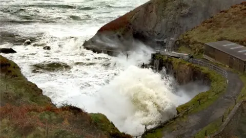 Greg morgan/RSPB RAMSEY ISLAND Ramsey Island is lashed by waves during Storm Ophelia