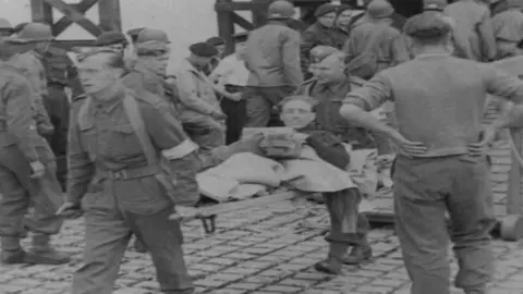 Pathe Casualties being unloaded