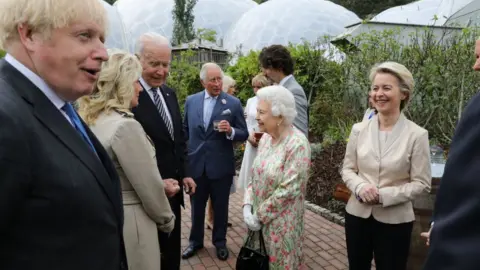 Getty Images The Queen speaks with Joe Biden and Jill Biden at the Eden Project