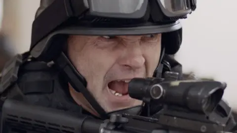 Netflix Andrew Howard as the NY police officer