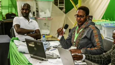 Getty Images An election commission official in Kenya